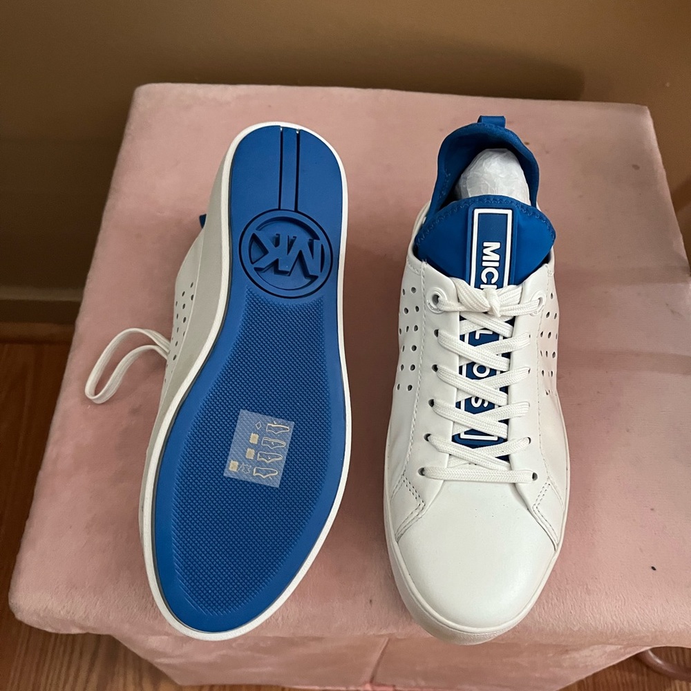 Micheal Kors blue and white designer sneakers.